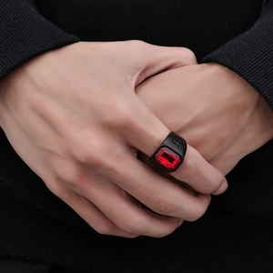 Men's punk style black stainless steel ring featuring a large square red ruby gemstone