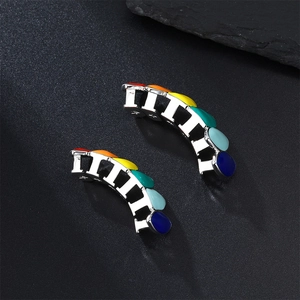 Grillz de hip hop arcoíris con piedras de colores y acabado plateado brillante