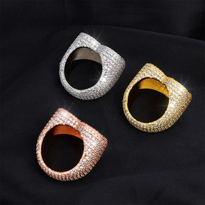 Detailed view of hip hop square rings in silver, gold, and rose gold with pavé zircons