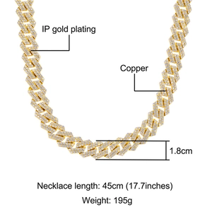 Detail van 1,8 cm koperen Cuban link ketting met IP gouden plating en zirkonia inlegwerk