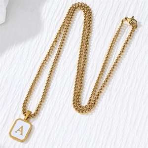 Golden Cuban link chain with rectangular shell pendant featuring letter A monogram