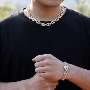 Hip-Hop-Halskette und Armband-Set aus vergoldetem Edelstahl mit glitzernden Zirkonia-Steinen