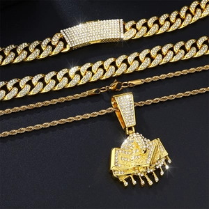 Vergoldetes Hip-Hop-Schmuckset mit Dollar-Anhänger und glänzenden Kubanischen Ketten