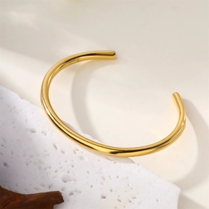 Bracelet jonc ouvert en C en acier inoxydable plaqué or 18 carats sur pierre blanche