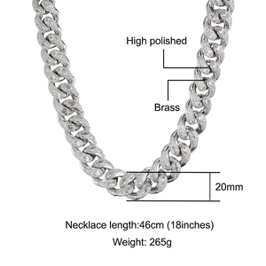 Close-up of 20mm high polished copper Cuban link necklace with zircon stones and pear-shaped detail
