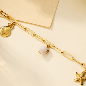 Golden Hawaiian beach anklet with starfish and shell charms on rectangle link chain