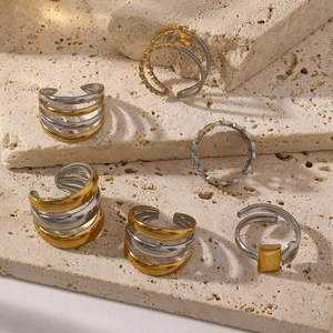 Minimalist two-tone stainless steel rings set in gold and silver finish with bold lines