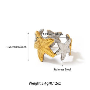 Macro detail of two-tone stainless steel starfish ring with size and weight specs