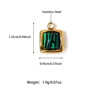 Detailed macro view of a gold-plated stainless steel square pendant with green malachite inlay