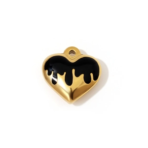 Macro shot of 18K gold plated heart pendant with black enamel liquid drip effect