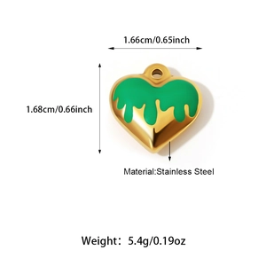 Macro detail of 18K gold plated heart pendant with green drip oil effect for DIY jewelry