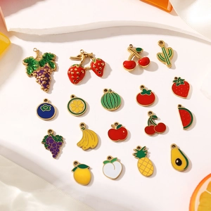Assorted colorful enamel fruit and plant charms for DIY jewelry making and crafts