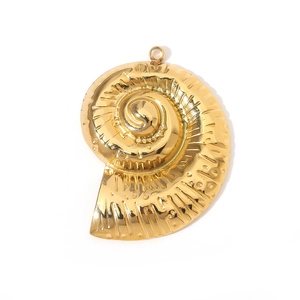 Golden nautilus shell pendant in stainless steel with textured spiral design