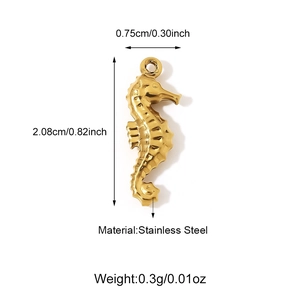Macro detail of golden seahorse pendant in stainless steel with size and weight metrics
