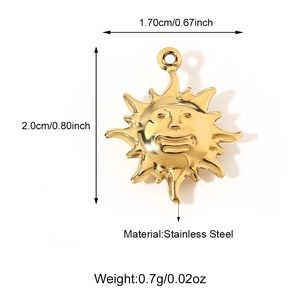 Macro view of gold stainless steel sun pendant with dimensions 1.70cm and 2.0cm