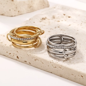 Polished stainless steel stacked rings in gold and silver with sparkling pavé crystals
