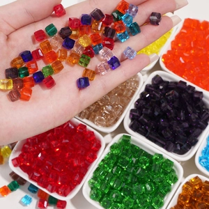 Macro detail of multi-color faceted cube crystal beads for DIY jewelry making