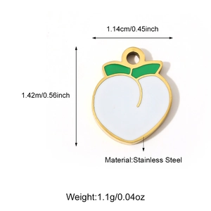 Golden peach shaped stainless steel pendant with white enamel and green leaf detail