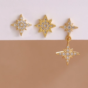 Star-shaped gold earrings set with micro-paved cubic zirconia for elegant women's wear
