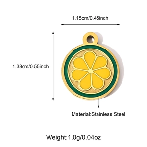 Lemon slice stainless steel pendant with yellow enamel and gold finish, 1.15cm wide