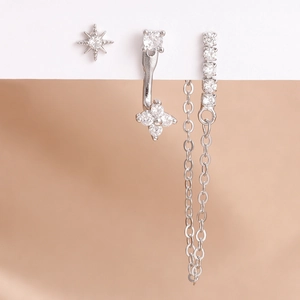 Juego de pendientes de estrella plateados con borlas de circón y diseño minimalista