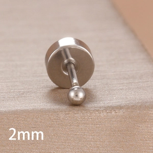 Macro view of 2mm polished silver metal ball stud earring with flat back design