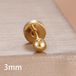 Macro detail of a 3mm polished gold ball stud earring with a flat back design