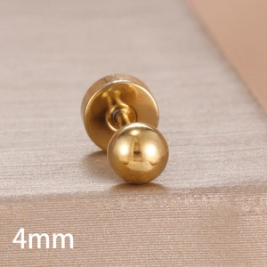 Macro detail of a 4mm polished gold ball stud earring with high-quality mirror finish