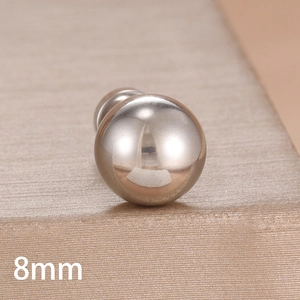 Macro shot of 8mm polished silver round ball stud earring with a smooth mirror finish