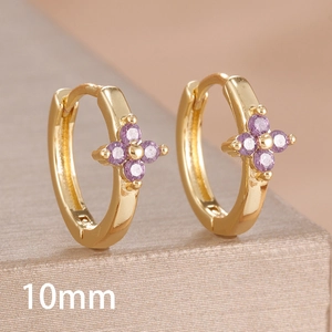 Detail view of 10mm gold hoop earrings featuring purple zircon clover floral charms
