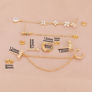 Detailed set of gold flower chain earrings and crystal studs with size measurements