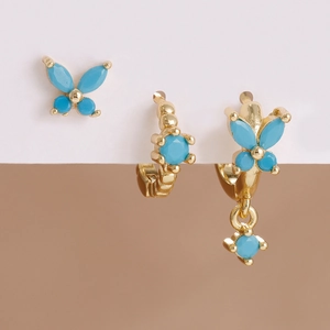 Golden stud earring set featuring blue turquoise butterfly and clover shaped stones