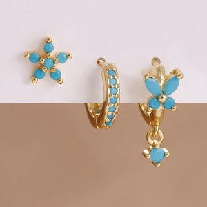 Three-piece gold earring set with micro-pave blue butterfly and floral zircon motifs