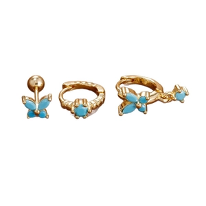 Three-piece gold earring set featuring turquoise butterfly studs and small hoop earrings