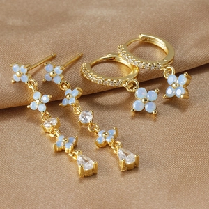 Gold-plated floral drop earrings set with blue opal petals and sparkling zircon accents