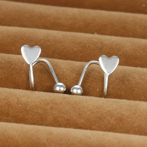 S925 sterling silver double heart screw-back earrings displayed on brown velvet background