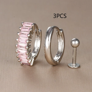 Detailed view of 3-piece silver earring set featuring pink zircon hoop and stud earrings