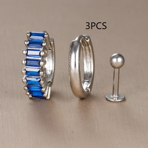 Detail view of 3pcs silver earring set with blue zircon inlay and polished hoop designs