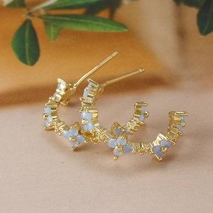 Elegant gold C-shaped hoop earrings with light blue opal gemstones and S925 silver needles