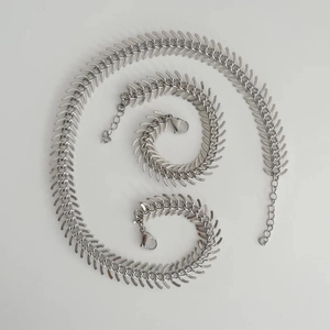 Detailed set of polished stainless steel fishbone chain necklace and bracelets