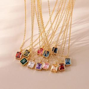 Collection of rectangular gemstone necklaces in various colors with 18k gold plating