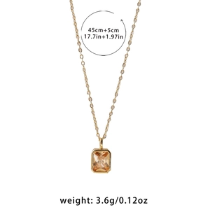 Detailed view of square champagne gemstone necklace with 18k gold plated chain and weight info