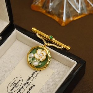 Vintage French style brooch with pearls and enamel flowers on a gold-plated base