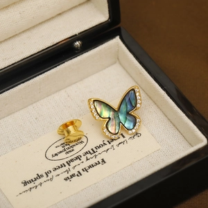 Exquisite butterfly brooch with abalone shell and sparkling cubic zirconia in gold