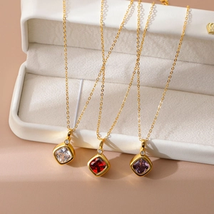 Elegant gold square zircon necklace set featuring white, red, and purple stone pendants