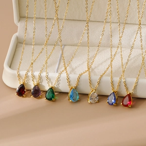 Golden 18k necklace with pear-cut birthstone zircon pendants in seven vibrant colors