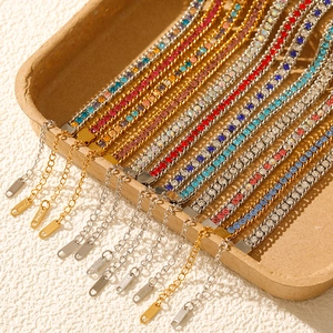 Detailed macro of multi-colored zircon tennis bracelets in gold and silver stainless steel