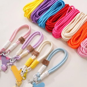 Multicolor braided polyester cords with handmade leather labels and metal rings