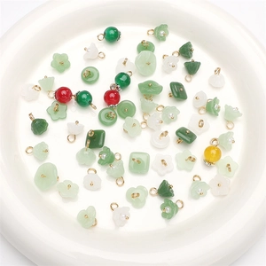 Assorted glass jade-style pendants in flower and disk shapes for DIY jewelry making