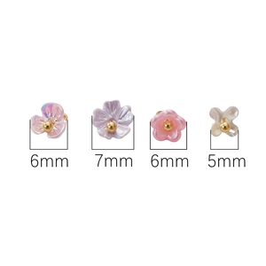 Mini resin lily of the valley flower and star charms for DIY jewelry making with gold beads